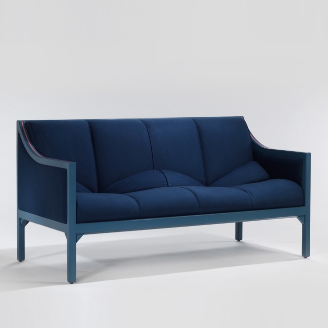 Blue upholstered sofa by Pierre Paulin
