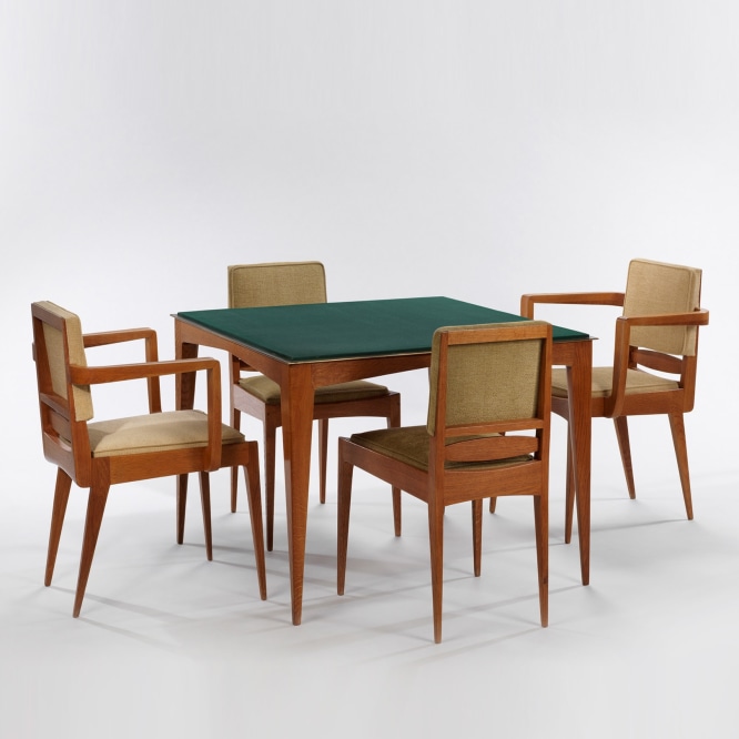 Felt topped game table with a set of four upholstered chairs; two with arms and two without