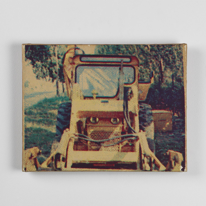 photo of a bulldozer painting on a white wall