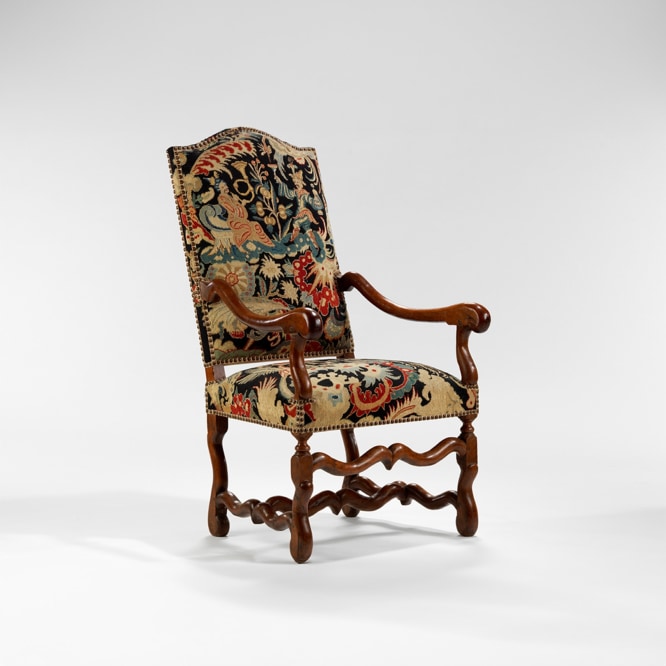picture of a antique chair in a gray room