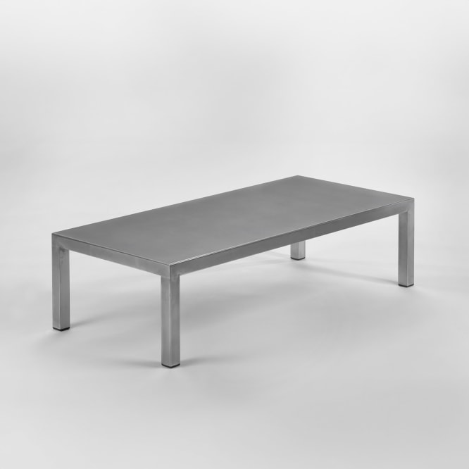 silver low table in a blank room