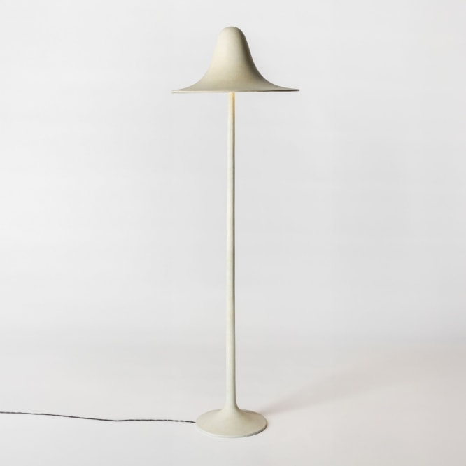 minimal lamp in an empty room