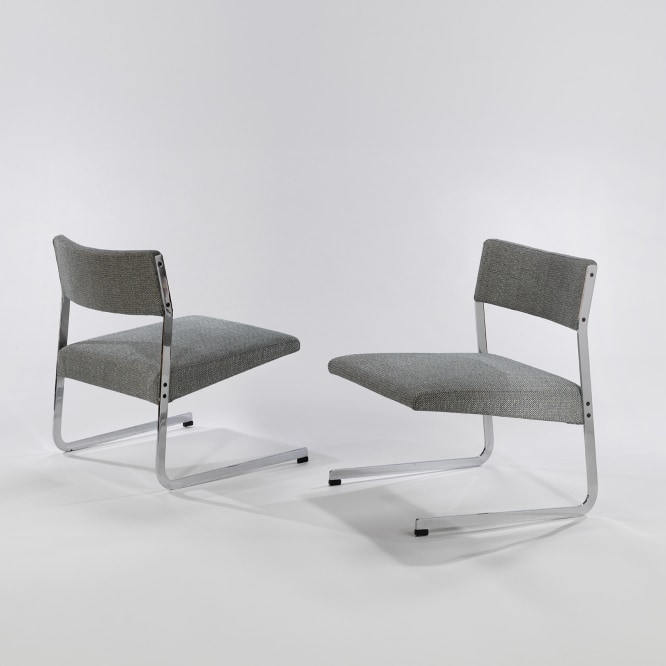 pair of gray Rigel Motte chairs in a gray room