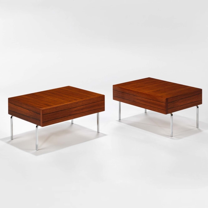 photograph of 2 side tables by Fermigier, tables have metal legs and teak tops