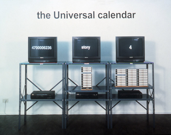 Jonathan Horowitz, The Universal Calendar, 1999, 43 continuous vhs tapes, industrial stand, wall text