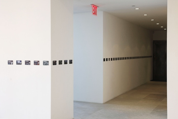 John Knight Worldebt, 1994 Lithography on aluminum 165 parts, 3 1/8 x 5 1/8 inches (8 x 13 cm) each