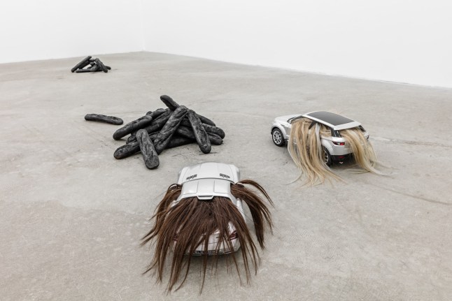 Man, 2017. Burnt baguettes, Dimensions variable.