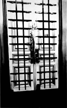 Untitled (interior apartment front door with bars 1938), 2000. Graphite and charcoal on mounted paper, 96 x 60 inches (243.8 x 152.4 cm). MP D-391
