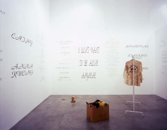 Mike Kelley, Written in the Wind, 1991 (Detail). Cardboard box, 10 found stuffed animals, coat rack with jacket & shirt, ten wall texts, dimensions variable. MP 9180