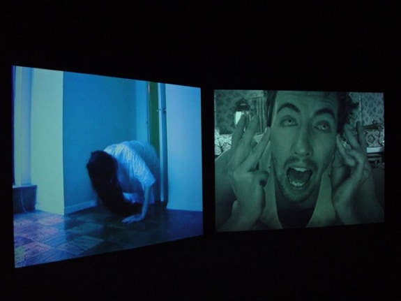 Installation view from "Home," 2003. Dual screen DVD shot with digital camera, 32 minutes. Edition of 5. MP V-7