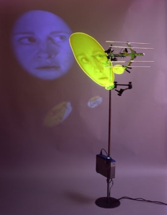 Endfire Array, 2001. Sony DPL CS2 projector, DVD player, DVD, metal, Performance by: Tracy Leipold, 76 x 32 x 41 inches + equipment. MP 310