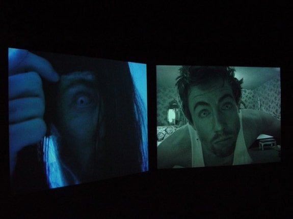Installation view from "Home," 2003. Dual screen DVD shot with digital camera, 32 minutes. Edition of 5. MP V-7