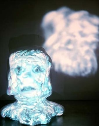 Nix, 2006. Fiberglass sculpture, Harmon Kardon HS100 5.1 sound system, Sony XGA VPL-PX41 projector, Sony VPL CX70 projector, 2 dvd players, 2 dvds, 1 master tape, 2 dvd players. 69 x 63 x 50 inches (175.3 x 160 x 127 cm). MP 461