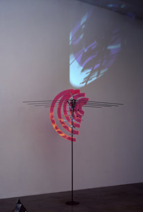 Wavefront, 2001. Sony DPL CS2 projector, DVD player, DVD, Metal, plexiglas. Performance by: Constance DeJong. 89 1/2 x 79 x 67 1/2 inches + equipment. MP 308