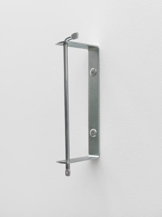 Clock, 2018. Galvanized steel, 10 1/4 x 2 x 3 5/8 inches (26 x 5.1 x 9.2 cm).