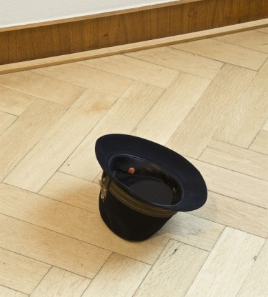 Chapeau d'encre, 2011. Dry India ink and Stanton hat, dimensions variable. Installation view, 2011. "From Threshhold to Threshhold," Kunstmuseen Krefeld/Museum Haus Esters, Germany. 