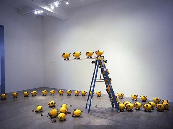 Olaf Breuning, A Group of Unstable Lemon Pigs, 2005. 72 pigs, styrofoam. MP 24