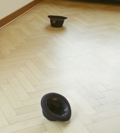 Chapeau d'encre, 2011. Dry India ink and Stanton hat, dimensions variable. Installation view, 2011. "From Threshhold to Threshhold," Kunstmuseen Krefeld/Museum Haus Esters, Germany. 