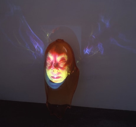 Drift, 2001. Sony DPL CS2 projector, DVD player, DVD, glass, fiberglass sphere, Performance by: Constance DeJong. 32 x 18 x 13 inches + equipment. MP 313