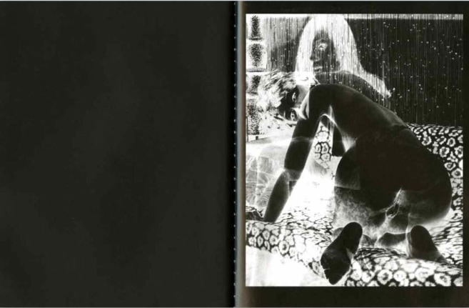 Signed gelatin silver print tipped into final page