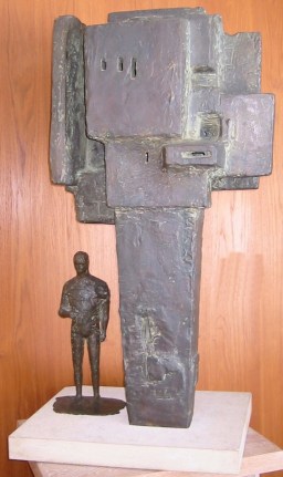 Image of sold abstract sculpture by Reg Butler entitled &quot;Macaw's Head&quot; featuring a small human figure  next to a large abstract form.