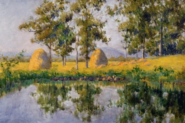 Image of sold oil painting of French landscape by Carl John Blenner showing a lake with a hayfield beyond it, and two large haystacks sitting among the trees.