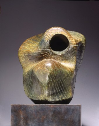 Image of sold sculpture by Henry Moore entitled &quot;Head&quot; showing a biomorphic shape made of bronze.