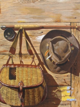 Image of John Atherton's sold oil painting entitled &quot;Fly Fishing Gear&quot; showing an old wicker fishing creel, part of a fishing rod and a battered old hat with fishing flies stuck in the hat band.
