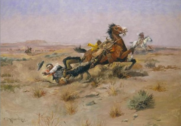 Image of Charles M. Russell's sold painting entitled &quot;Incident Near Square Butte&quot; showing a man being dragged by a horse because his foot is caught in the stirrup.