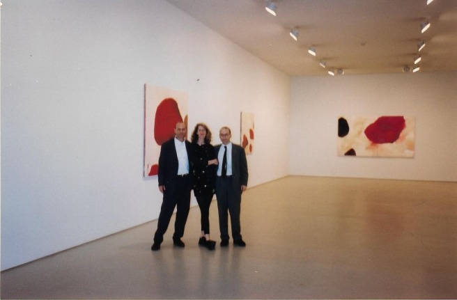 Peter Blum, Louise Belcourt, and friend, Installation of Paintings