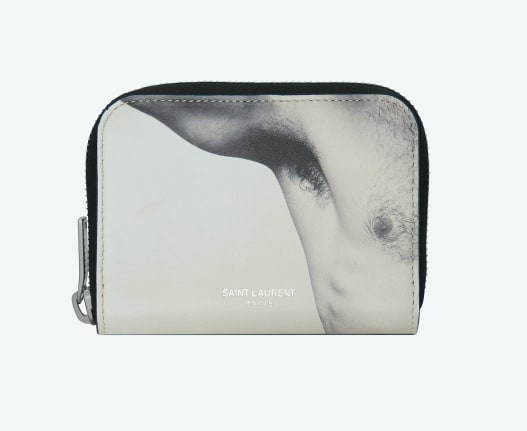 Wallet with a photograph of a man's raised arm showing his armpit and a portion of his chest.