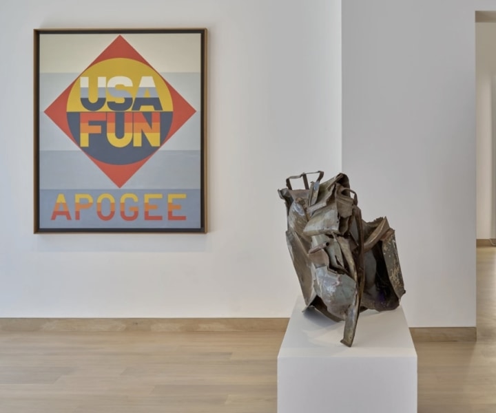 Installation view of Found in America: Chamberlain, Flavin, Indiana at Waddington Custot Galleries, London with Indiana's painting Apogee