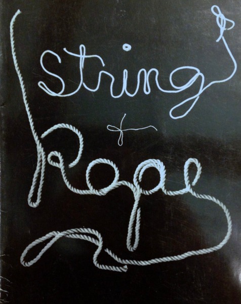 Cover of the exhibition catalogue for String and Rope - white rope spells out the exhibition's title against a black background