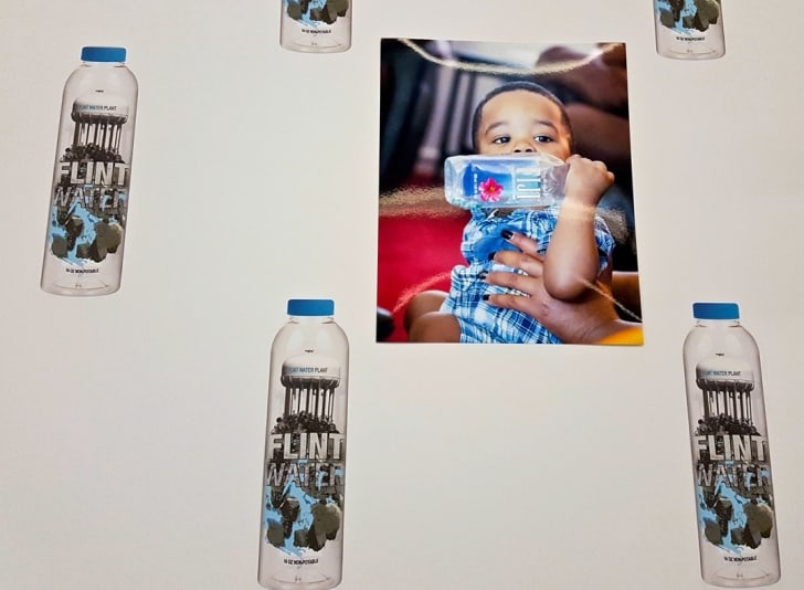 Pope.L’s Conceptual Bottled Water Project Calls Attention to the Crisis in Flint