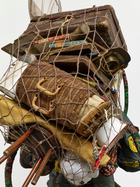 fishnet holding many miscellaneous objects