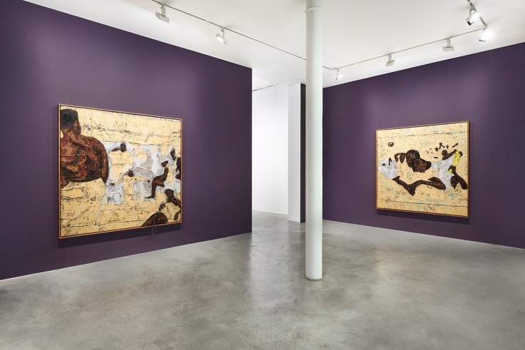 installation view of two beige paintings