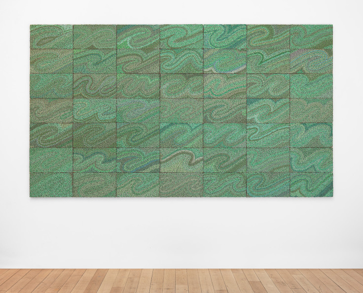 wires and components organized into a swirly, green surface