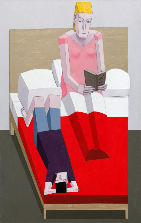 Woman reads a book in bed while glancing sideways at man laying next to her