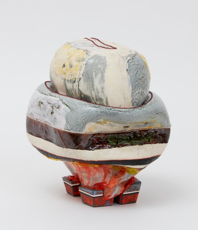 Bulbous sculpture with a pertrusion coming out from the top of the object by Kathy Butterly.