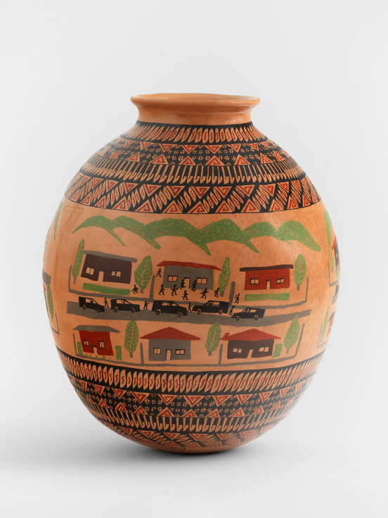 Ceramic pot made from clay collected from the Sierra Madre Occidental mountain range in Northern Mexico and painted with locally-sourced mineral pigments.