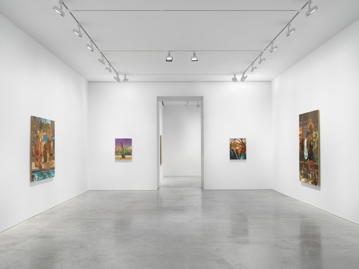 gallery with several artworks with an entryway in the center that leads to another room with art