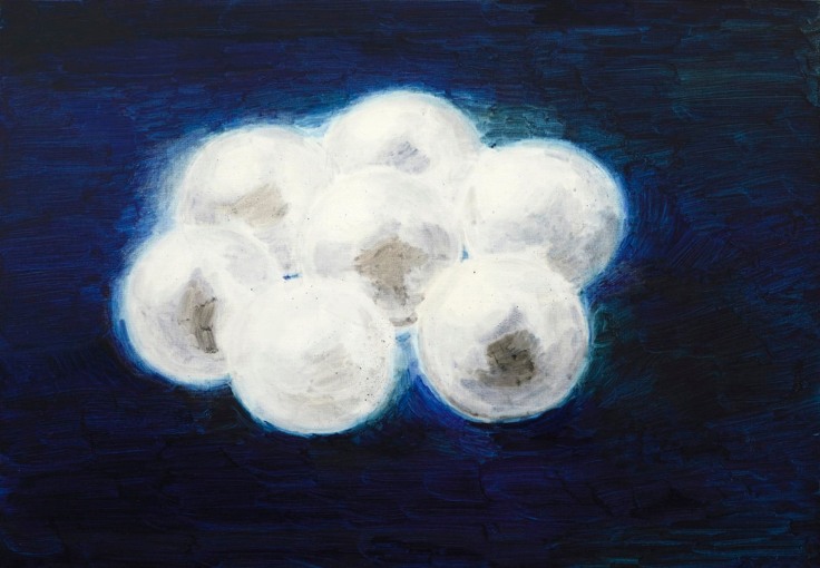 painting of white beads against a blue background
