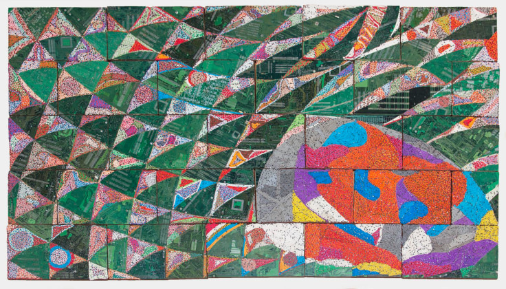 geometric pattern surrounding an abstract shape containing multiple colors