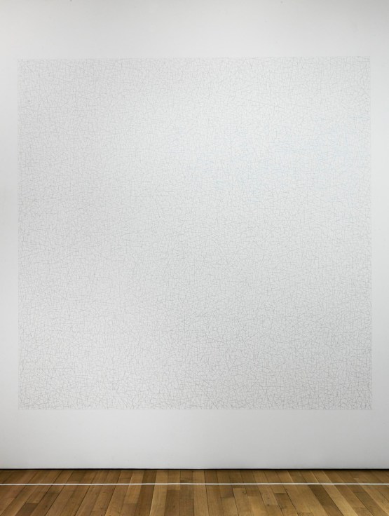 a wall drawing that seems to be made of dots and shaped into a perfect square