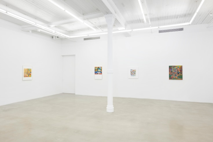 Installation view of four artworks