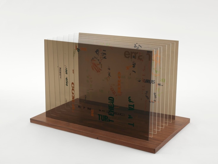 , JOHN CAGE&nbsp;Not Wanting to Say Anything About Marcel Plexigram IV,&nbsp;1969&nbsp;Screenprint on eight Plexiglas panels with walnut base&nbsp;14 x 20 x 1/8 in. (35.6 x 50.8 x 0.3 cm)