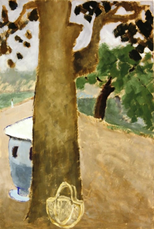 tree with a purse placed beside it