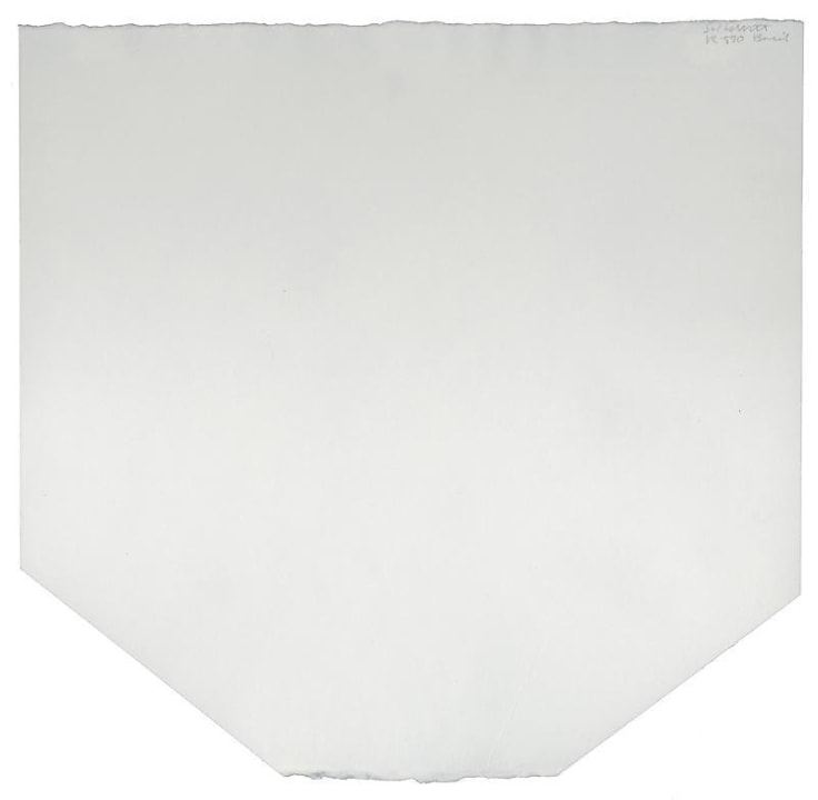 torn piece of plain paper