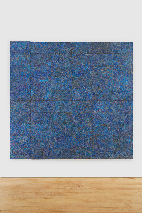 Blue tiles composed of reclaimed electrical wires and components