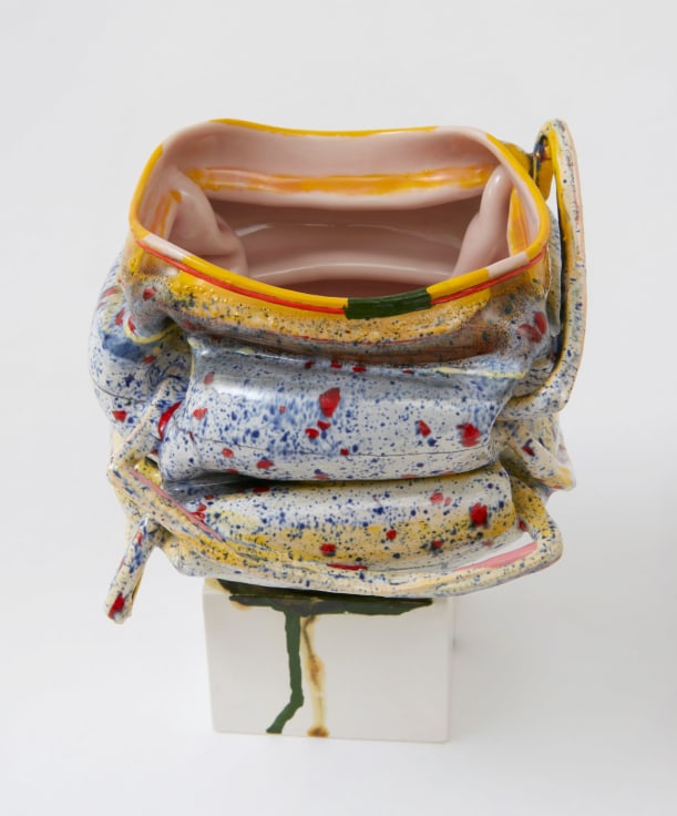 Ridged porcelain pot with pieces of porcelain jutting out by Kathy Butterly.